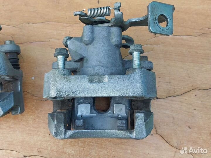 Суппорт тормозной задний тойота королла 150