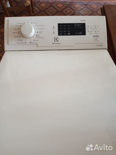 Стиральная машина с вертикальной загрузкой