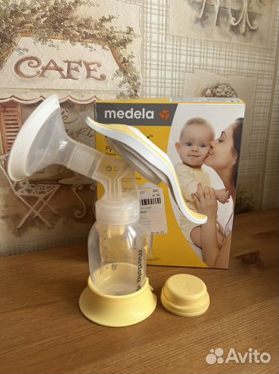 Молокоотсос medela ручной