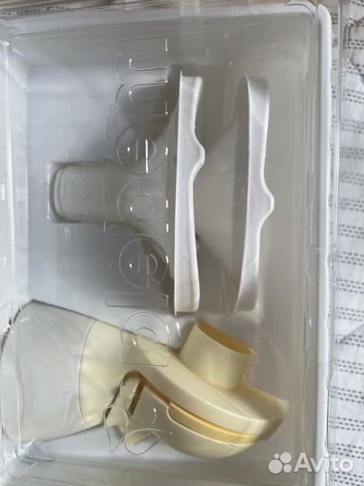 Молокоотсос medela электрический