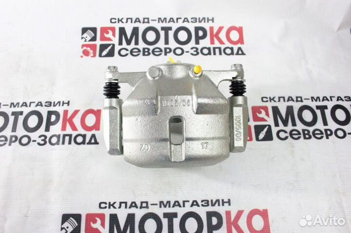 Суппорт тормозной передний левый Nissan X-Trail