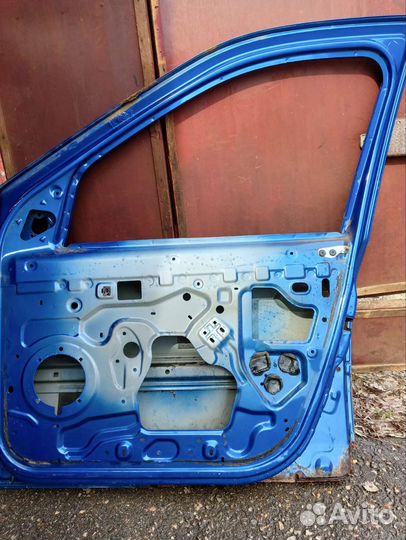 Дверь передняя правая renault logan 1