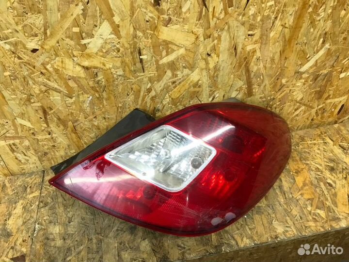 Фонарь заднего хода задний правый Opel Corsa D