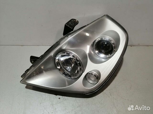 Фара левая Ssang Yong Rexton 2001-2007г