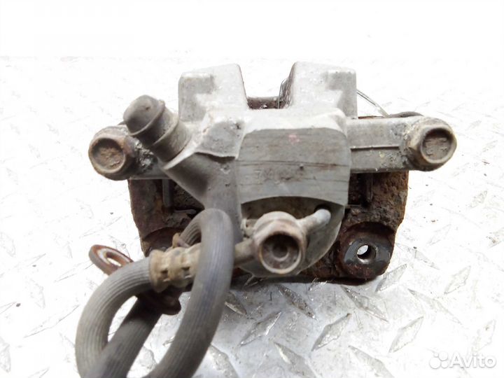 Суппорт задний правый Toyota Camry 6 XV40