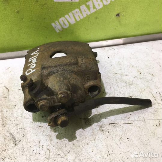 Суппорт передний левый Фольксваген Поло