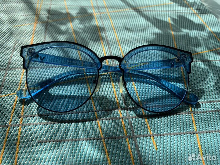 Солнечные очки женские