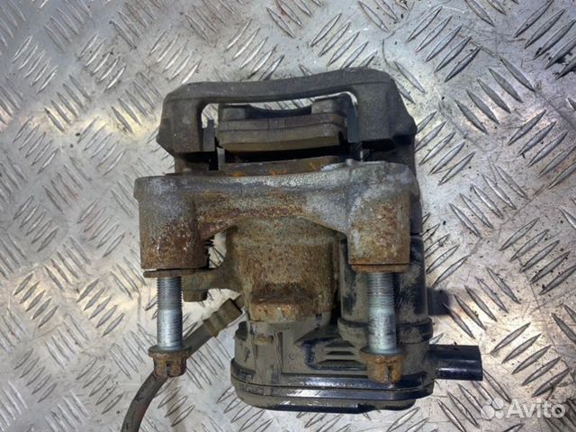 Суппорт тормозной задний правый Kia Optima 4 JF