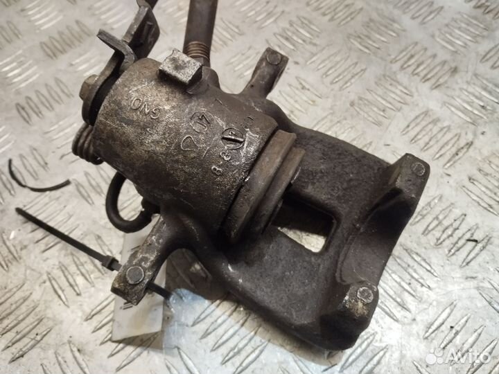 Суппорт задний правый Skoda Octavia A5