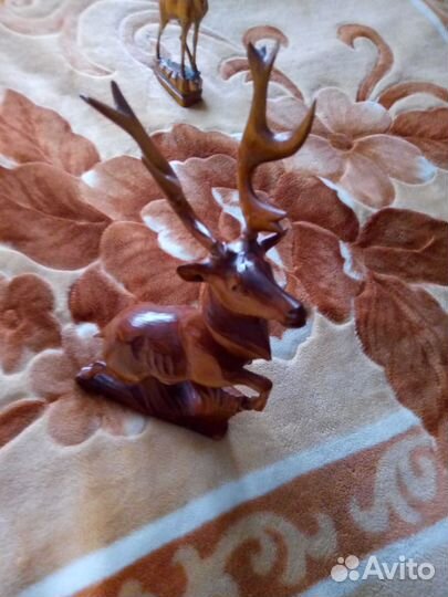 Три деревянных богородских оленя