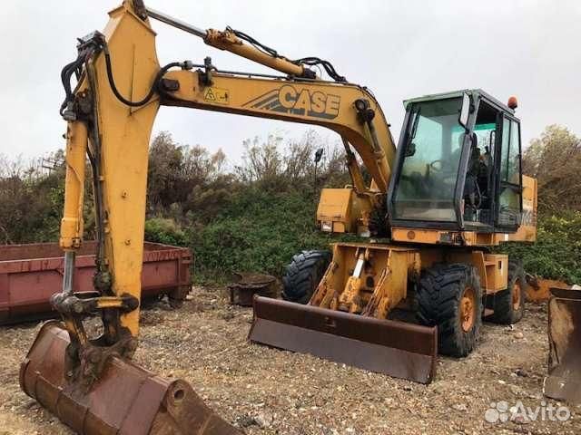 Авторазбор экскаваторов погрузчиков. Демонтаж здания экскаватором. Case 580 sk. Спецтехника для сноса зданий. Строительный демонтаж.