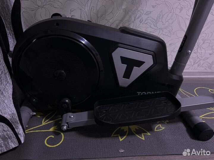 Эллиптический тренажер torneo