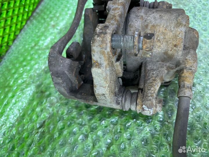 Суппорт тормозной передний правый Opel Corsa D