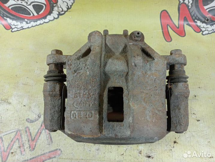 Суппорт тормозной передний левый Kia Rio 2 2010