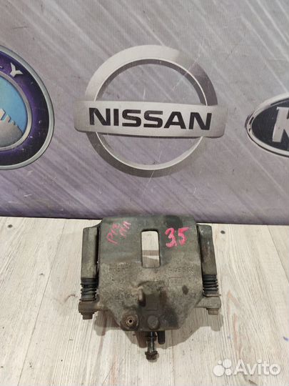 Суппорт тормозной перед Nissan primera P12 Лев