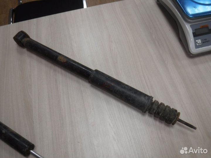 Амортизатор задний левый Renault Logan K7J 2009