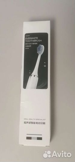 Электрическая зубная щетка
