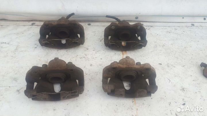 Суппорт передний Opel Astra Опель Астра