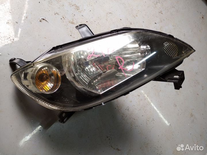 Фара Mazda Demio 2002-2005