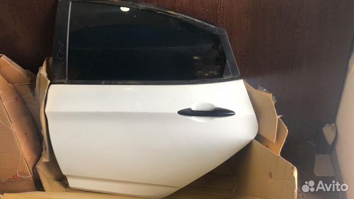 Дверь задняя левая solaris 770034L000