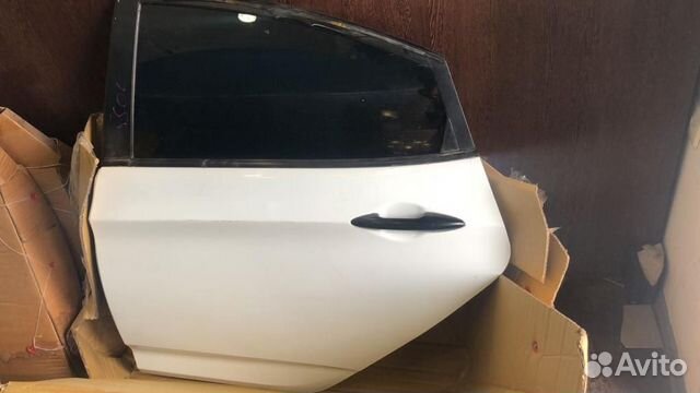 Дверь задняя левая solaris 770034L000