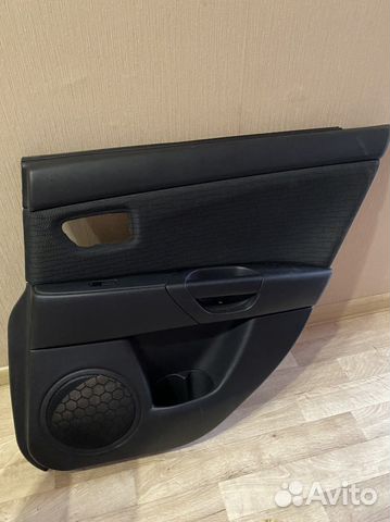 Обшивка задней правой двери mazda 3 bk/axella