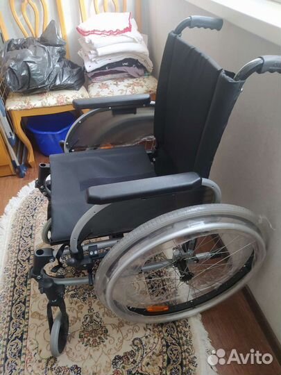 Инвалидная коляска
