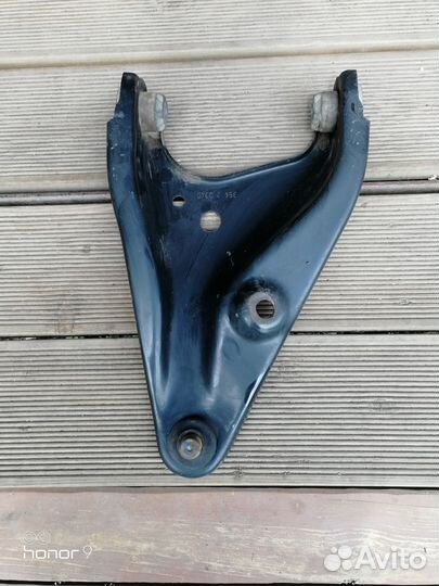 Рычаг передний левый