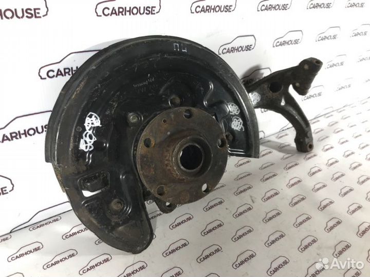 Кулак поворотный передний левый Volkswagen Passat