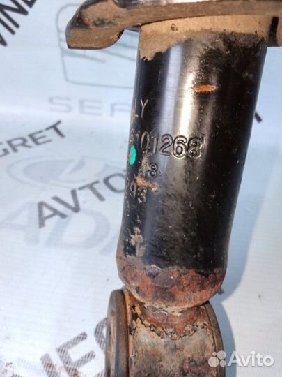 Стойка амортизатор заднего Geely Emgrand EC7