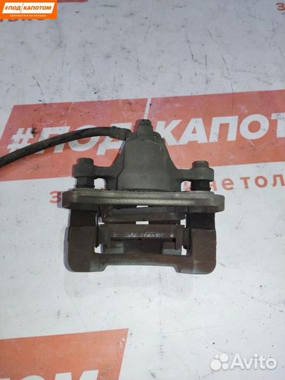 Суппорт тормозной задний левый Hyundai ix35 2009