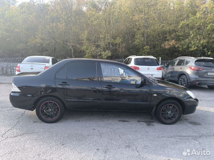 Mitsubishi Lancer 1.6 МТ, 2005, 169 000 км