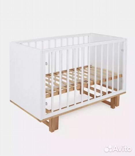 Кроватка с продольным маятником