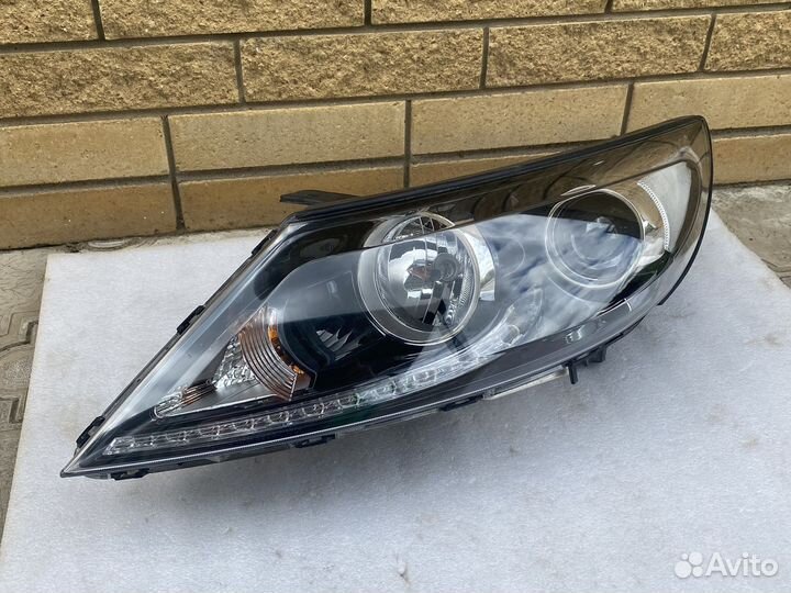 Фара ксенон левая KIA Sportage 3 дхо LED