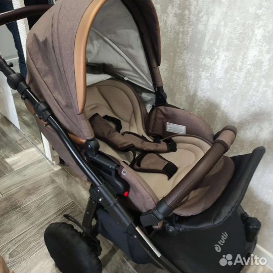 Коляска тутис