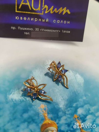 Золотые серьги с топазом