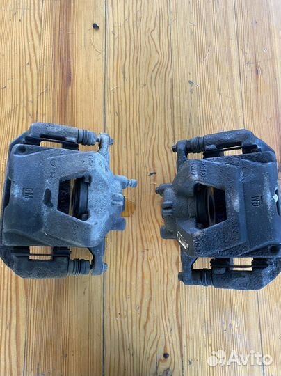 Суппорт передний левый Chevrolet Aveo T300