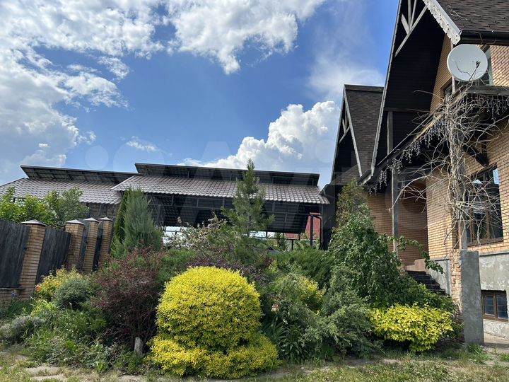 Дом 411 м² на участке 15 сот.