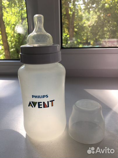 Молокоотсос ручной + 2 бутылочки с сосками Avent