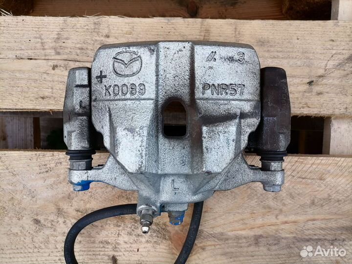 Передний тормозной суппорт мазда 6 GJ