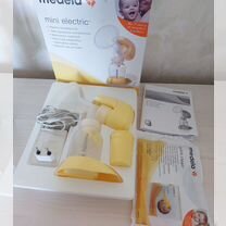 Молокоотсос medela электрический