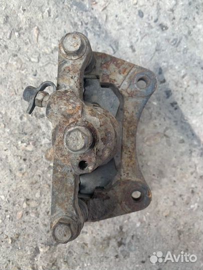 Суппорт задний левый Chevrolet Lacetti J200 F18D3