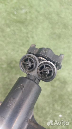 Форсунка омывателя фары левой Peugeot Expert 2010