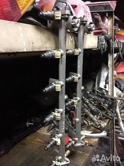 Рейка топливная Mercedes W140 A1040780845