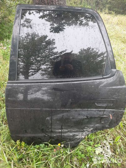 Дверь corolla spacio