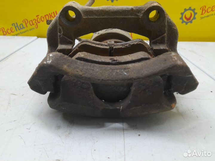 Суппорт передний правый Volkswagen Passat B5