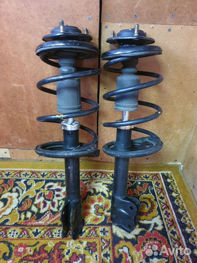 Стойка амортизатора передняя,митсубиши кольт