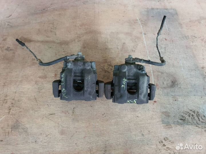 Суппорт задний BMW X5 E53, до рестайлинга, 2002г