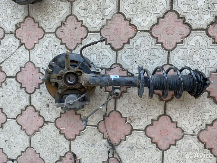 Стойка амортизатора передняя Hyundai Tucson 3