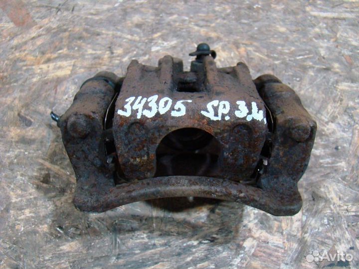 KIA Sportage 2 Суппорт тормозной задний левый